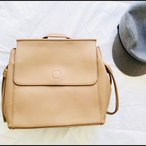 Shop Simple Essentials Bags - Contemporary Vegan Leather Backpack- Beige Shop Simple Essentials Bags - Contemporary Vegan Leather Backpack- Beige